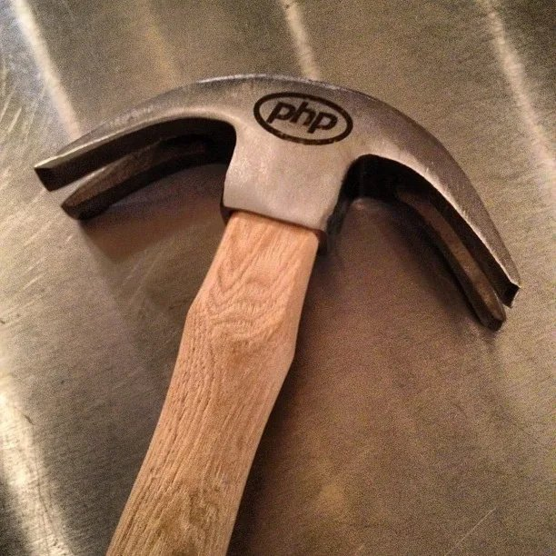 A hammer with no head but two claws with the PHP logo on the side.